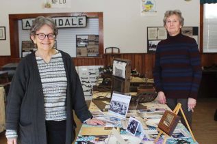 Sarah Hale and Teresa Scott with the Kennebec Historical Society display at the Frontenac Heritage Festival in Arden Saturday. Photo/Craig Bakay